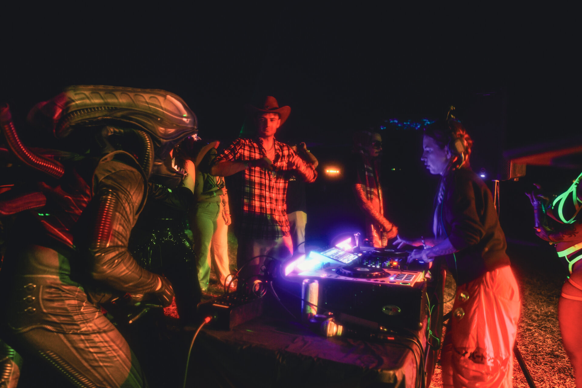 Nightlife crowd in low light at a San Antonio event