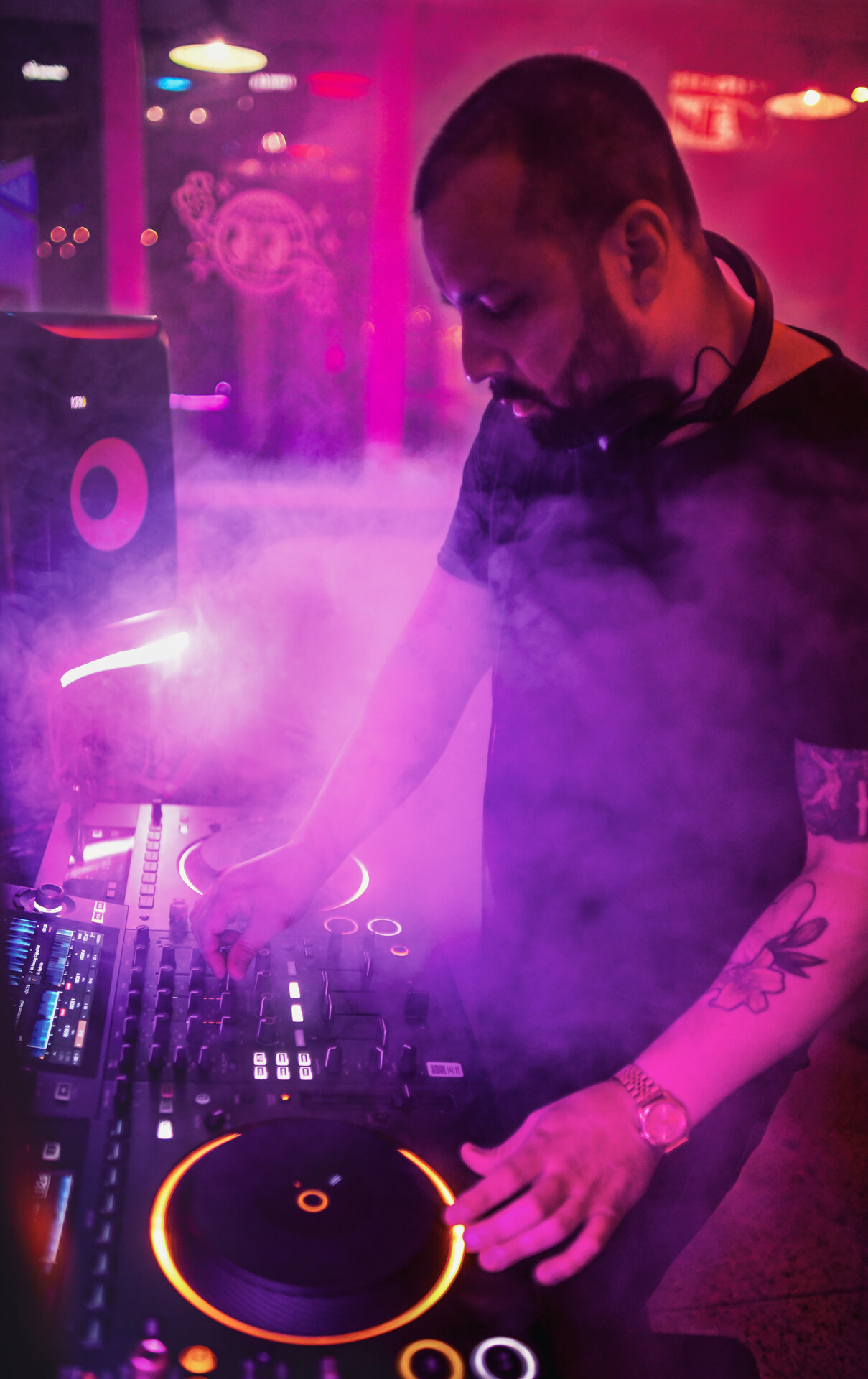 DJ performance photography purple smoke